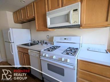 Main picture of 1200 W Wellington Ave & 3000-08 N Racine Ave