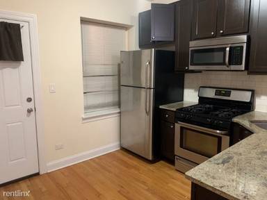 Main picture of 2035-37 W Arthur Avenue 6446-56 Seeley Ave