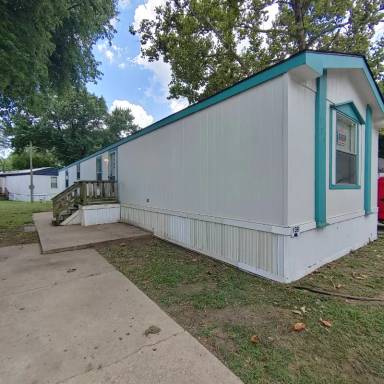 Main picture of The Woodlands Manufactured Home Community