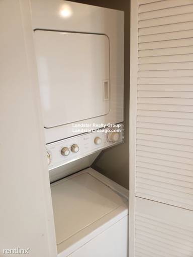 Main picture of 2038-48 W Touhy Ave & 7213-29 N Rogers Ave