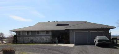 Main picture of 1228 NE Brown Dr
