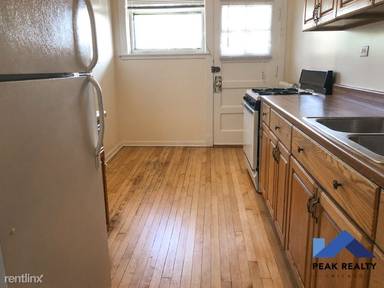 Main picture of 7064-7074 N Ashland Blvd Apartments