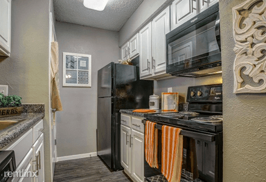 Main picture of 1100 W Trinity Mills Condominium