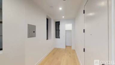 Main picture of 141 E 3rd St