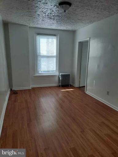 Main picture of 6634 Woodland Ave