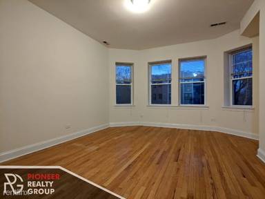 Main picture of 2035-37 W Arthur Avenue 6446-56 Seeley Ave