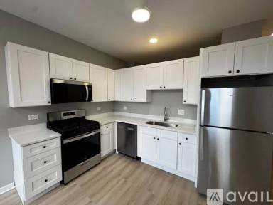 Main picture of 3234 N Pulaski Rd & 4009 W School St Apartments