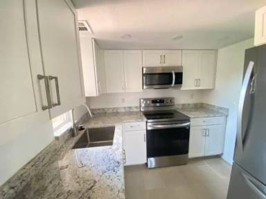 Main picture of 1566 SE Royal Green Cir