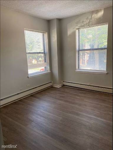 Main picture of 7048-50 S Merrill Ave