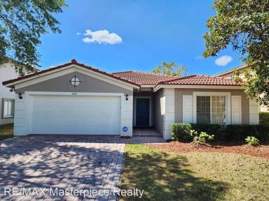 Main picture of 1910 SW Newport Isles Blvd