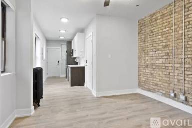 Main picture of 1649-55 W Jonquil Ter & 7651-9 N Paulina St