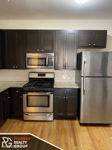 Main picture of 2035-37 W Arthur Avenue 6446-56 Seeley Ave