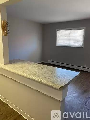 Main picture of 115 E 2nd St