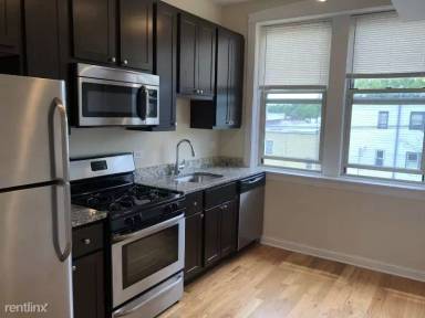 Main picture of 4844-58 N Drake Ave & 3537 W Ainslie St