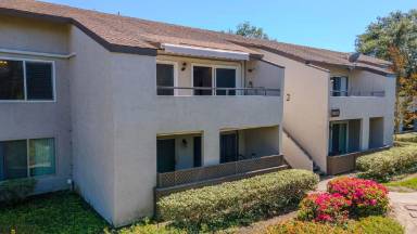 Main picture of beautifully upgraded 2-bedroom, 1-bath condo in the highly desirable Bench Mark Villas Community