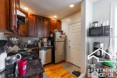 Main picture of 1249-55 W Henderson St & 3323-25 N Lakewood Ave