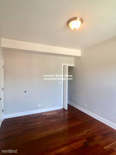 Main picture of 2038-48 W Touhy Ave & 7213-29 N Rogers Ave