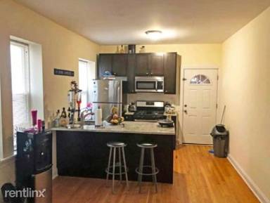 Main picture of 2035-37 W Arthur Avenue 6446-56 Seeley Ave