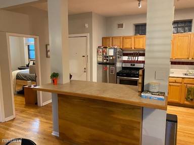 Main picture of 810 W Newport Ave & 3438 N Halsted St Apartments