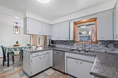 Main picture of 7220 N Drumheller St