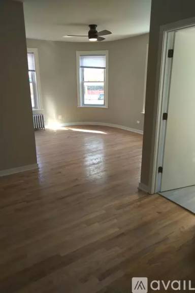 Main picture of 3234 N Pulaski Rd & 4009 W School St Apartments