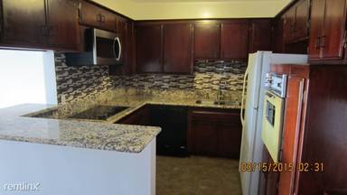 Main picture of 10961 Palms Blvd