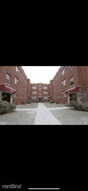 Main picture of 105 E 70th St & 7007 S Michigan Ave Apartments