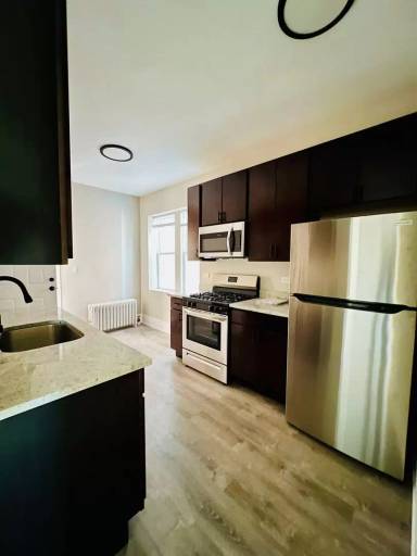 Main picture of 3249-55 N Karlov Avenue 4057-59 School St