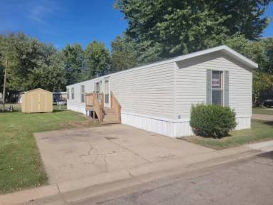 Main picture of The Woodlands Manufactured Home Community