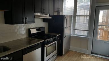 Main picture of 1507-11 W Barry Ave & 3052-58 N Greenview Ave