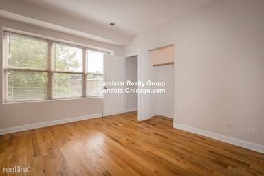 Main picture of 2038-48 W Touhy Ave & 7213-29 N Rogers Ave