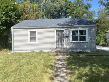 Main picture of 940 E 49th Ave