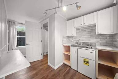 Main picture of 1343 1/2 S Florence Pl