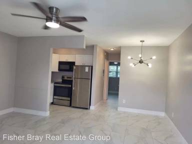 Main picture of 704 NE 23 Dr And 2217 7 Ave