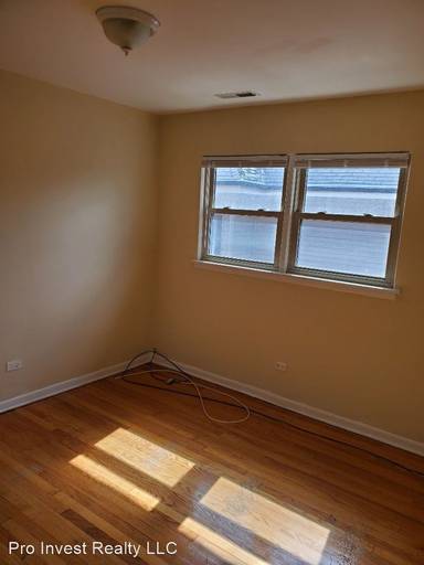 Main picture of 7661 S Coles Ave
