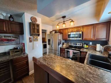 Main picture of 6329 E 32nd Ave