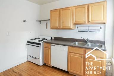 Main picture of 1507-11 W Barry Ave & 3052-58 N Greenview Ave