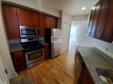 Main picture of 2038-48 W Touhy Ave & 7213-29 N Rogers Ave