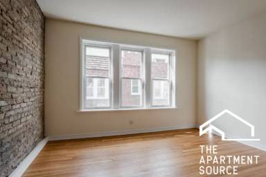 Main picture of 3034-48 W Wellington Ave & 3000-08 N Whipple St