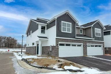 Main picture of Grandview END UNIT townhome plan in Corcoran’s Hope Meadows community—a brand-new townhome development near Pheasant Acres Golf Course and just a short distance from Elm Creek Park Reserve.