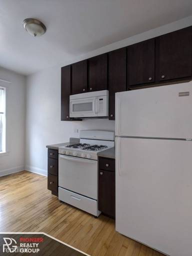Main picture of 1524 N Kedzie St & 3209-3211 W Pierce St