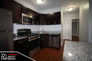 Main picture of 7736-42 N Ashland Ave & 1609-11 W Juneway Ter
