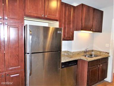 Main picture of 4101-09 N Kedzie Ave & 3154-56 W Belle Plaine Ave