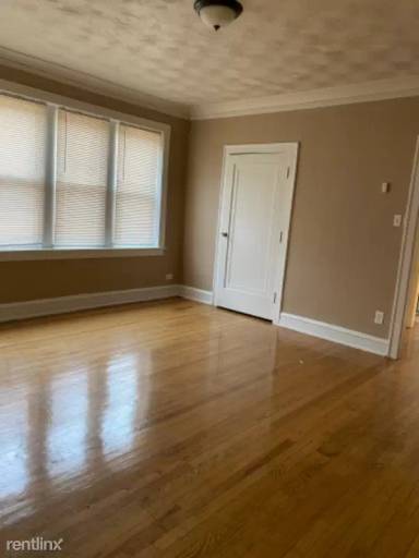 Main picture of 7517 S Coles Ave