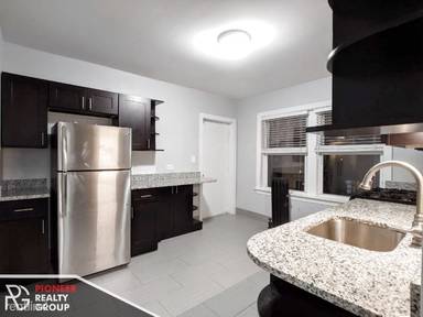 Main picture of 7736-42 N Ashland Ave & 1609-11 W Juneway Ter