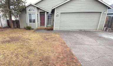 Main picture of 1871 NE Windy Tree Ct