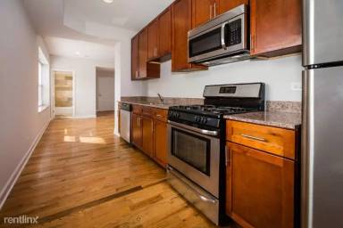 Main picture of 2038-48 W Touhy Ave & 7213-29 N Rogers Ave