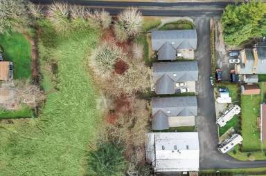 Main picture of 9604 Fruitland Ave E and 7502-7506 96th St E Apartments