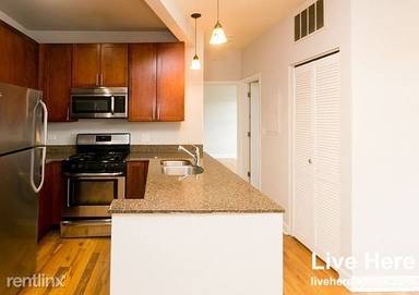 Main picture of 2038-48 W Touhy Ave & 7213-29 N Rogers Ave