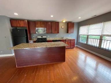 Main picture of 6806 S Lafayette Ave